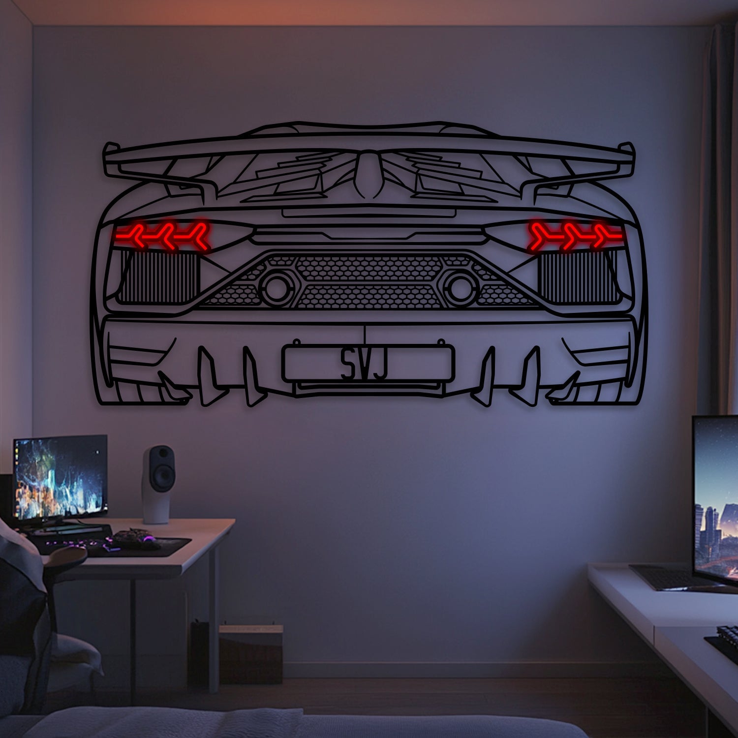 The Aventador SVJ Back View Metal Neon Car Wall Art (MTN0262) with red LED tail lights is mounted above a dual-monitor desk and gaming chair, adding modern, stylish ambiance with striking neon car decor to the gaming room.