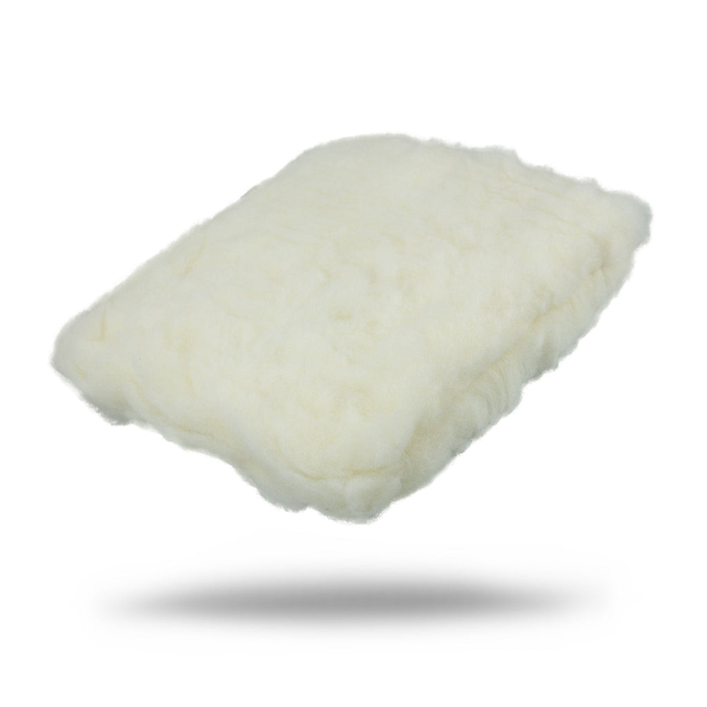 The Synthetic Wool Cleaning Pad is a rectangular, ultra-soft car cleaning pad made of fluffy white synthetic wool, shown floating above a white surface with a soft shadow below.