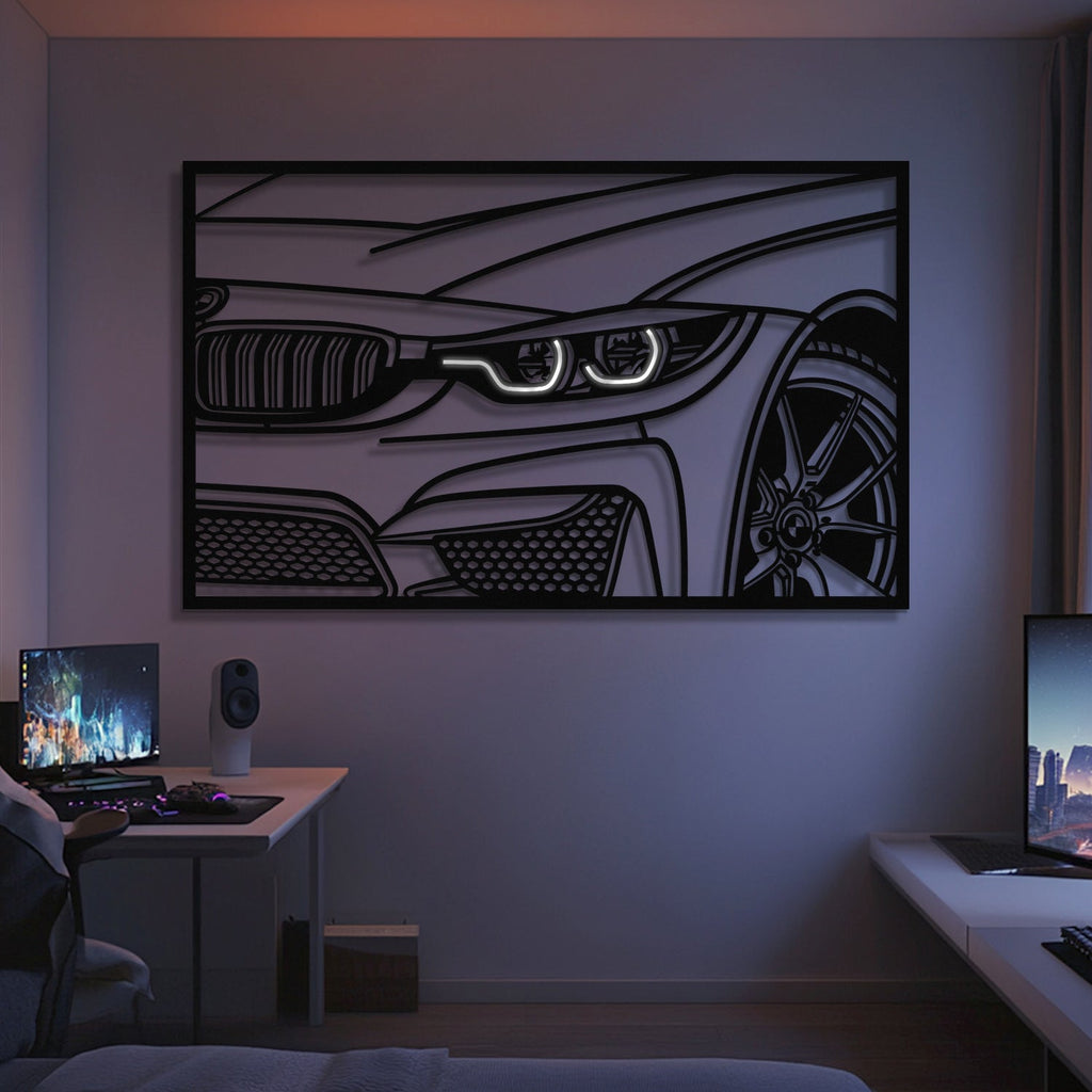 A modern room with two desk setups, each with a computer and monitor, showcases the F82 M4 Apex Front View Metal Neon Frame Wall Art (MT1478) above the central desk area—making it an ideal gift for car enthusiasts.