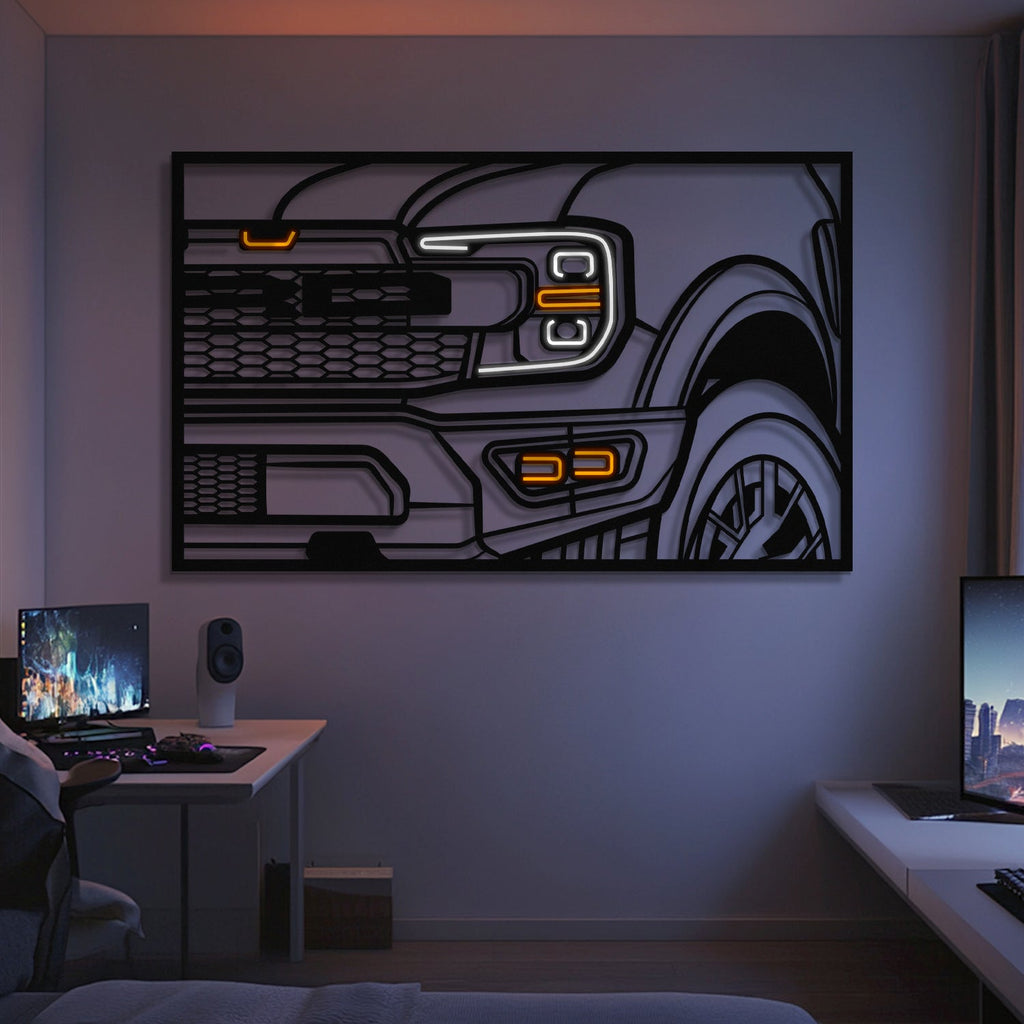 A modern room with dual computer desks and monitors showcases the F150 Raptor Apex Front View Metal Neon Frame Wall Art (MT1479). Subtle, ambient lighting sets the perfect atmosphere—an ideal gift for any car enthusiast.
