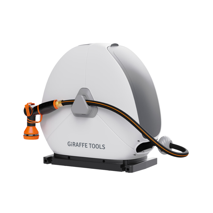 The Ground-Mounted Retractable Hose Reel 82ft-130ft, in white and gray with an orange nozzle, is mounted on a black base against a plain background.