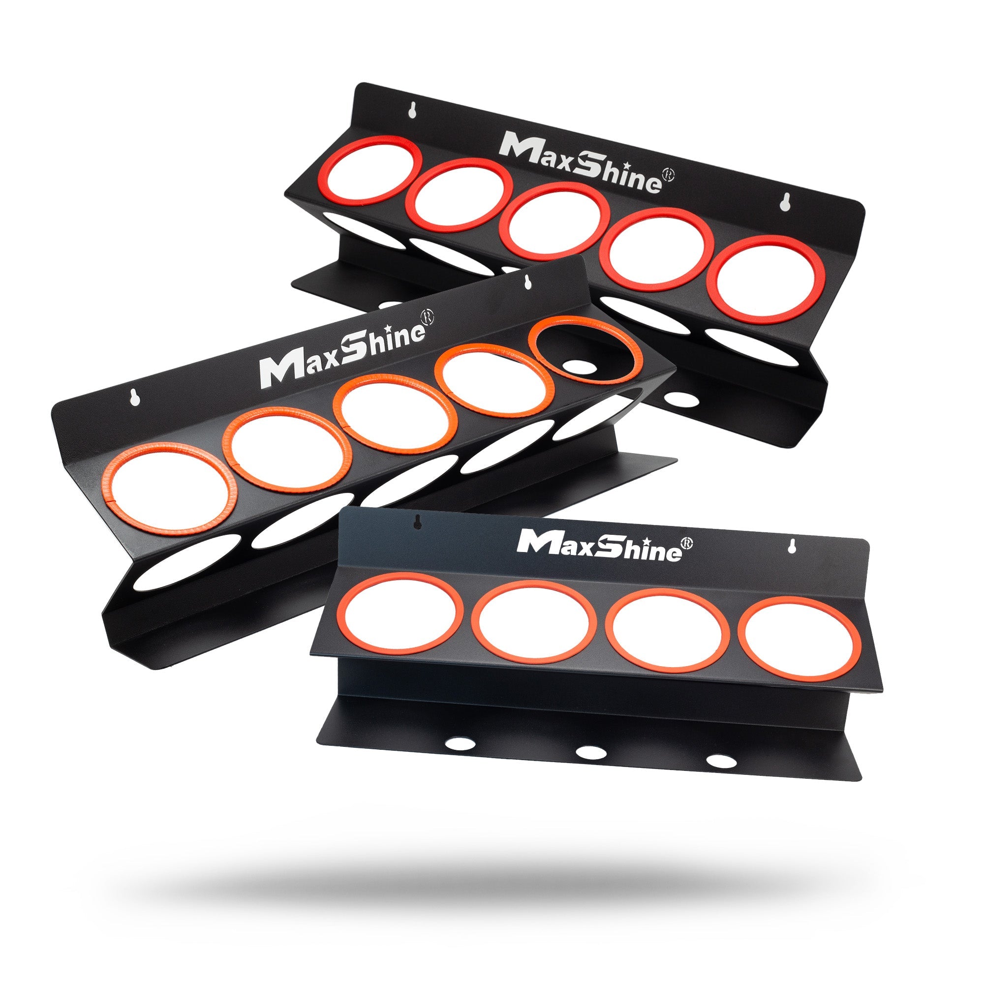 Three black metal Spray Bottle Racks (16oz, 32oz, 34oz), each with four red-outlined circular slots and MaxShine branding, are wall-mounted in a staggered layout on a white background—ideal for garage organization.