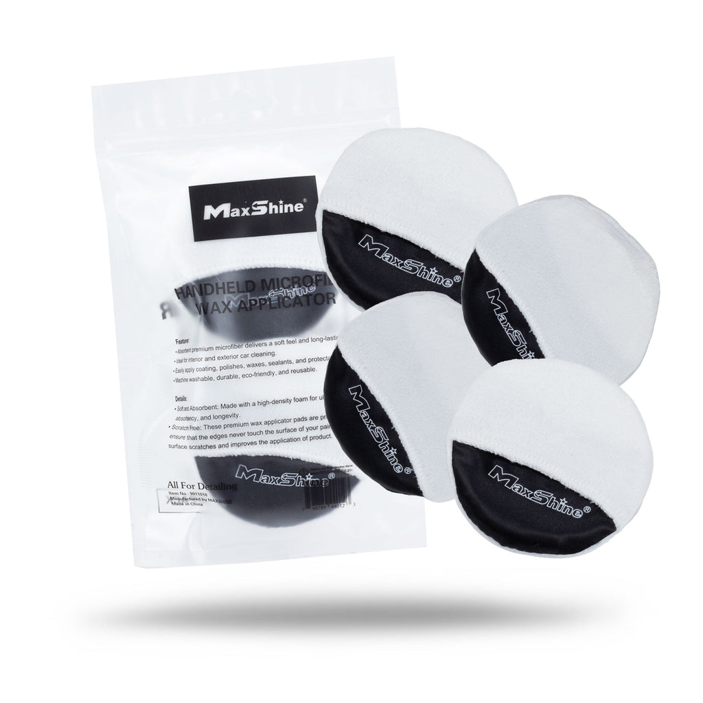 Four Finger Hold Microfiber Wax Applicator Pads (4 Pack), mostly white with a black logo section, are displayed beside clear packaging with product details. Ideal for precise waxing and easy handling.