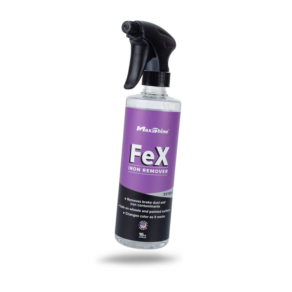 The 16oz Wheel Cleaner | FeX Iron Remover features a black nozzle and purple label, and effectively removes iron deposits and brake dust from wheels and painted surfaces.