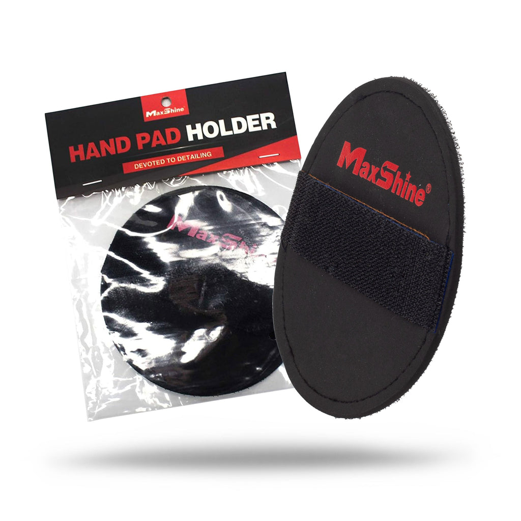 A Hand Polishing Pad Holder is displayed, featuring an oval black pad with grip strap and packaging labeled "HAND PAD HOLDER" in bold white and red. The pad attaches easily using a hook and loop fastener.