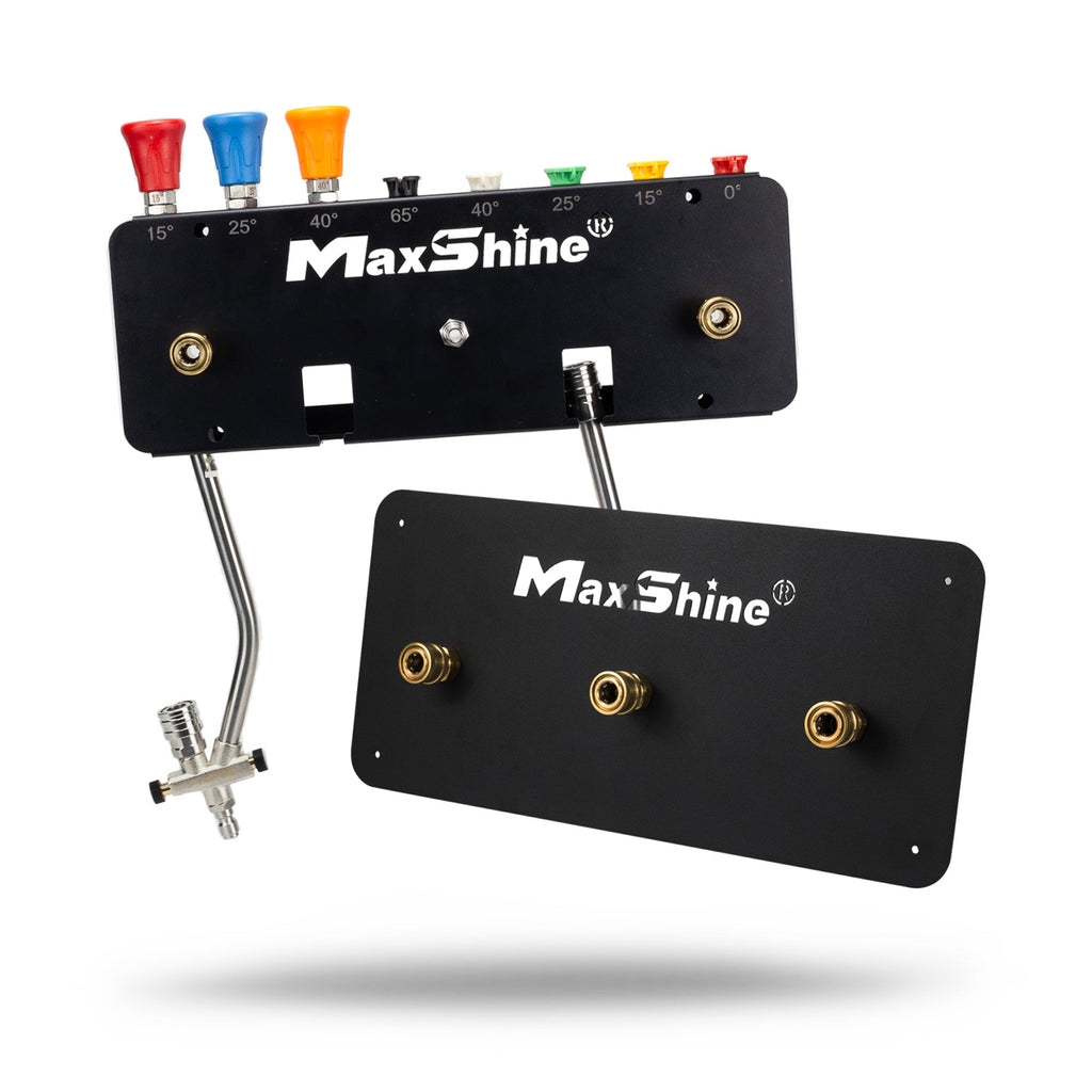 Two black Foam Cannon Wall Mounts with labeled slots organize colored pressure washer nozzles and spray wands; one mount holds four nozzles, the other holds three brass hose connectors—perfect for foam cannon storage.