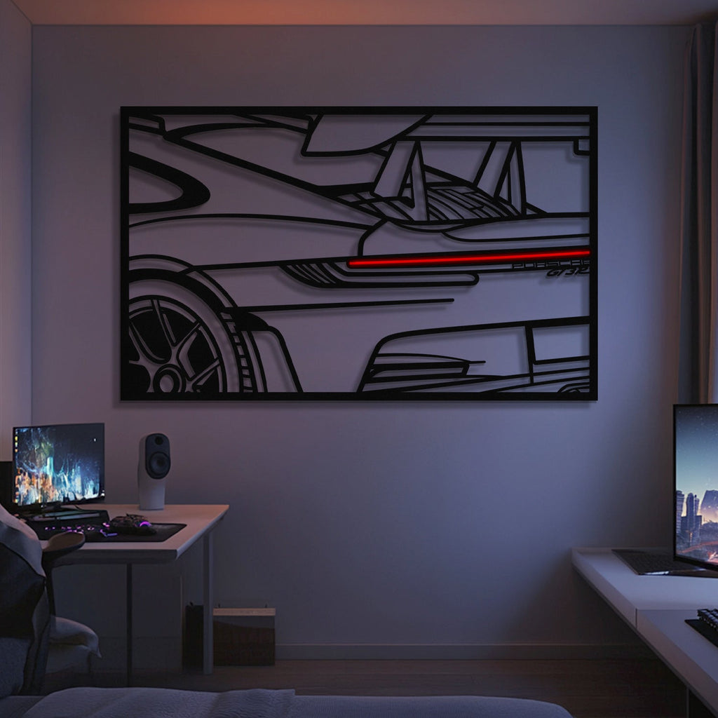 A modern bedroom with dual computer desks and monitors features the 911 GT3 RS Apex Back View Metal Neon Frame Wall Art (MT1481) above the bed—an ideal car enthusiast gift. The black line art of the rear sports car is softly lit for a stylish look.